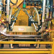 Automated Weld Cell in AGS Windsor, Ontario 140,000 sq ft facility uses robots to weld nuts onto upper and lower reinforcements for GMs Colorado/Canyon Program.